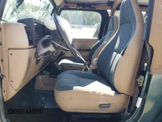 2001 Jeep Wrangler Sahara with VIN 1J4FA59S71P339334, listed as a Copart auction lot 74805224 with 265,778 mi miles and Salvage Title. Bid and sale history available at carsss.com. Image 7.