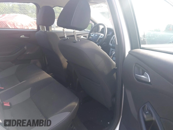 2013 Ford Focus SE with VIN 1FADP3F26DL249436, listed as a IAAI auction lot 42668702 with 79,182 mi miles and . Bid and sale history available at DreamBid. Image 8.