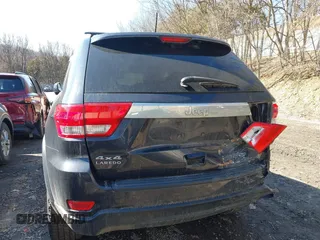 2013 Jeep Grand Cherokee Laredo with VIN 1C4RJFAG4DC653079, listed as a IAAI auction lot 41726726 with 152,356 mi miles. Bid and sale history available at carsss.com. Image 18.