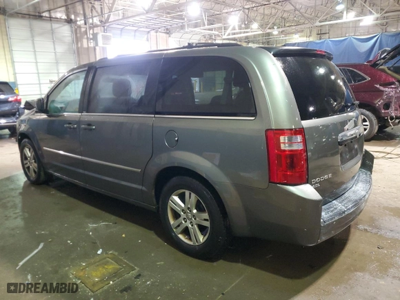 2010 Dodge Grand Caravan SXT with VIN 2D4RN5DX4AR403132, listed as a Copart auction lot 85802634 with 135,094 mi miles and Clean Title. Bid and sale history available at carsss.com. Image 2.
