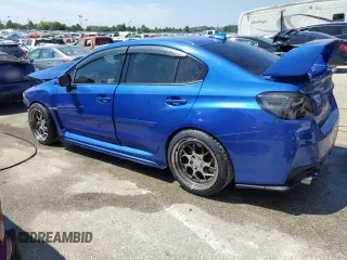 2016 Subaru WRX STI with VIN JF1VA2M64G9833602, listed as a Copart auction lot 68547164 with 102,919 mi miles and Salvage title. Bid and sale history available at DreamBid. Image 2.