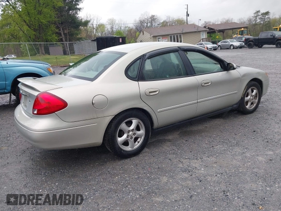 2003 Ford Taurus SES Standard with VIN 1FAFP55U43A140202, listed as a IAAI auction lot 41994960 with 90,650 mi miles. Bid and sale history available at carsss.com. Image 4.