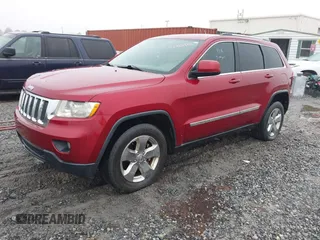 2013 Jeep Grand Cherokee Laredo with VIN 1C4RJEAG0DC516926, listed as a IAAI auction lot 41800254 with 259,006 mi miles. Bid and sale history available at carsss.com. Image 17.