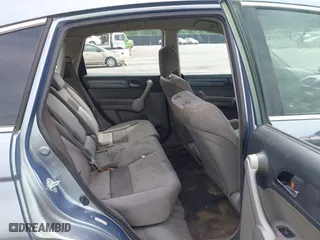 2007 Honda CR-V LX with VIN JHLRE48317C057561, listed as a IAAI auction lot 42119266 with 307,373 mi miles. Bid and sale history available at carsss.com. Image 8.