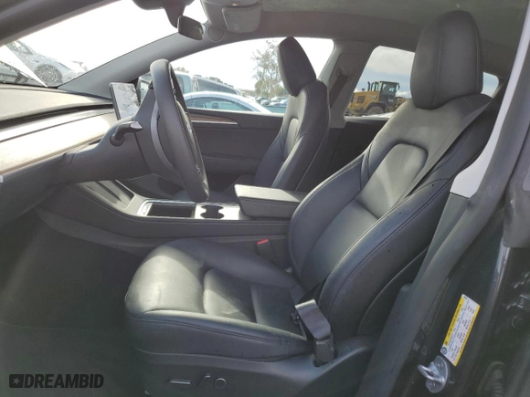 2024 Tesla Model Y Long Range with VIN 7SAYGAEE0RF023725, listed as a Copart auction lot 82674744 with 28,384 mi miles and Salvage Title. Bid and sale history available at carsss.com. Image 7.