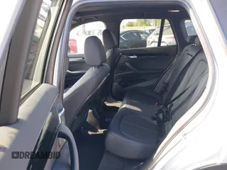 2019 BMW X1 xDrive28i with VIN WBXHT3C56K5L38658, listed as a IAAI auction lot 42496734 with 49,373 mi miles and . Bid and sale history available at DreamBid. Image 8.
