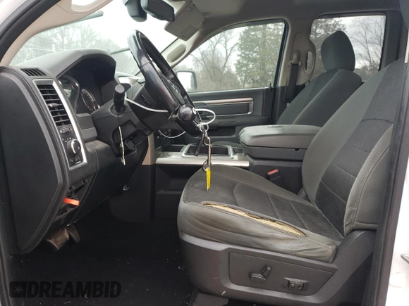 2015 Ram 1500 SLT with VIN 1C6RR6GTXFS581558, listed as a Copart auction lot 87273674 with 211,308 mi miles and Clean title. Bid and sale history available at DreamBid. Image 7.