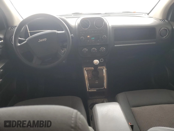 2010 Jeep Compass Sport with VIN 1J4NF4FB6AD521894, listed as a Copart auction lot 46027325 with 149,230 mi miles and Salvage Title. Bid and sale history available at carsss.com. Image 8.