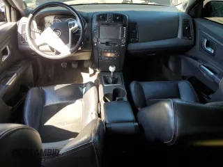 2004 Cadillac CTS-V z VIN 1G6DN57S440130637, wystawiony jako Copart lot #57805015 z przebiegiem 145 633 mil mil oraz Szkody całkowita. Historia ofert i sprzedaży dostępna na DreamBid. Obrazek 8.