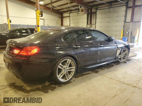 2015 BMW 6 Series 640i xDrive z VIN WBA6B8C58FD453159, wystawiony jako Copart lot #88931285 z przebiegiem 145 656 mil mil oraz Szkoda całkowita • Salvage title. Historia ofert i sprzedaży dostępna na DreamBid. Obrazek 3.