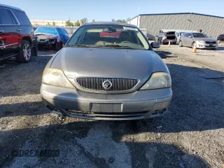 2004 Mercury Sable LS Premium with VIN 1MEHM55S84A614002, listed as a Copart auction lot 56582965 with 185,589 mi miles and Salvage title. Bid and sale history available at DreamBid. Image 5.