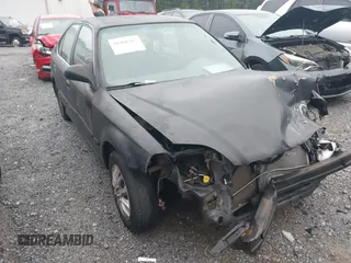 2000 Honda Civic LX with VIN 1HGEJ6674YL005143, listed as a IAAI auction lot 41961215 with 252,818 mi miles. Bid and sale history available at carsss.com. Image 1.