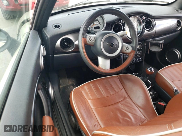 2008 MINI Convertible with VIN WMWRF33518TF67472, listed as a Copart auction lot 72073604 with 61,024 mi miles and Salvage title. Bid and sale history available at DreamBid. Image 8.
