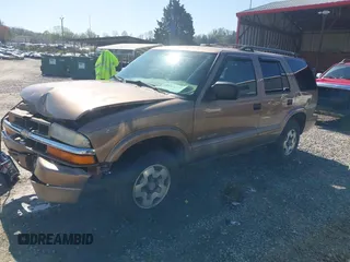 2004 Chevrolet Blazer LS z VIN 1GNDT13X24K167825, wystawiony jako IAAI lot #41976732 z przebiegiem 142 647 mil mil oraz . Historia ofert i sprzedaży dostępna na DreamBid. Obrazek 18.