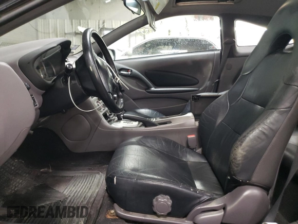2000 Toyota Celica GTS with VIN JTDDY32T0Y0023275, listed as a Copart auction lot 50836735 with 154,144 mi miles and Salvage Title. Bid and sale history available at DreamBid. Image 7.