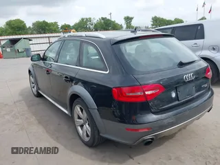 2014 Audi allroad Premium Plus with VIN WA1UFAFL2EA092988, listed as a IAAI auction lot 41879196 with 147,063 mi miles. Bid and sale history available at carsss.com. Image 3.