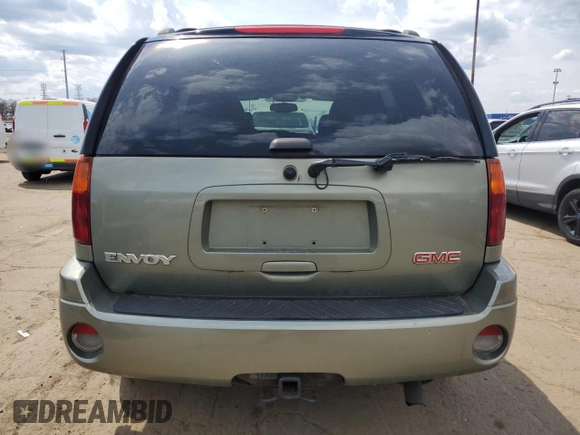 2003 GMC Envoy SLT with VIN 1GKDT13S032112192, listed as a Copart auction lot 54351985 with 297,007 mi miles and Clean Title. Bid and sale history available at carsss.com. Image 6.