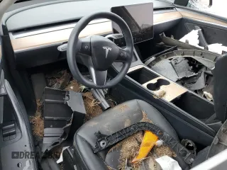 2023 Tesla Model Y Long Range z VIN 7SAYGDEE7PF870370, wystawiony jako Copart lot #55700135 z przebiegiem 32 410 mil mil oraz Szkoda całkowita • Salvage title. Historia ofert i sprzedaży dostępna na DreamBid. Obrazek 8.