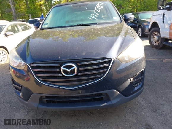 2016 Mazda CX-5 Sport with VIN JM3KE2BY3G0657904, listed as a IAAI auction lot 42127897 with 153,855 mi miles. Bid and sale history available at carsss.com. Image 12.