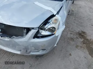 2012 Nissan Altima S z VIN 1N4AL2AP5CC189238, wystawiony jako IAAI lot #41686213 z przebiegiem 101 970 mil mil oraz . Historia ofert i sprzedaży dostępna na DreamBid. Obrazek 12.