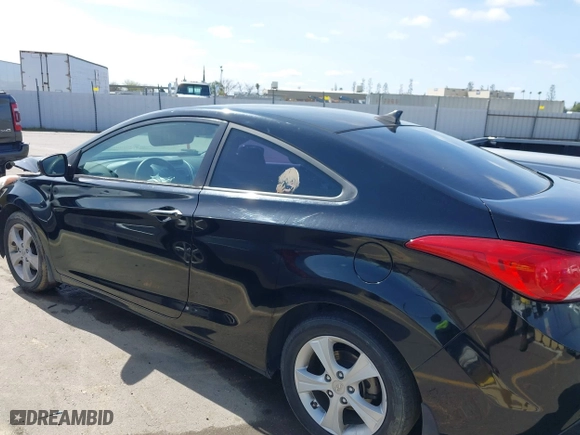 2013 Hyundai Elantra Coupe GS with VIN KMHDH6AE4DU023377, listed as a IAAI auction lot 41847471 with 134,772 mi miles. Bid and sale history available at carsss.com. Image 15.