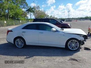 2025 Cadillac CT4 Premium Luxury z VIN 1G6DB5RK3S0110690, wystawiony jako IAAI lot #41540815 z przebiegiem 1 749 mil mil oraz . Historia ofert i sprzedaży dostępna na DreamBid. Obrazek 13.