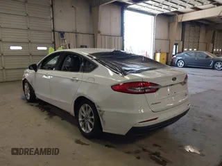2020 Ford Fusion Hybrid SE with VIN 3FA6P0LU7LR173500, listed as a IAAI auction lot 41368311 with 105,202 mi miles. Bid and sale history available at carsss.com. Image 3.