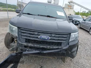 2016 Ford Police Interceptor Utility z VIN 1FM5K8AR6GGA19144, wystawiony jako IAAI lot #42199096 z przebiegiem 148 808 mil mil oraz . Historia ofert i sprzedaży dostępna na DreamBid. Obrazek 13.