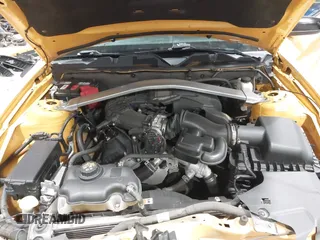 2011 Ford Mustang V6 with VIN 1ZVBP8AM4B5152063, listed as a IAAI auction lot 41556393 with 125,604 mi miles and . Bid and sale history available at carsss.com. Image 10.