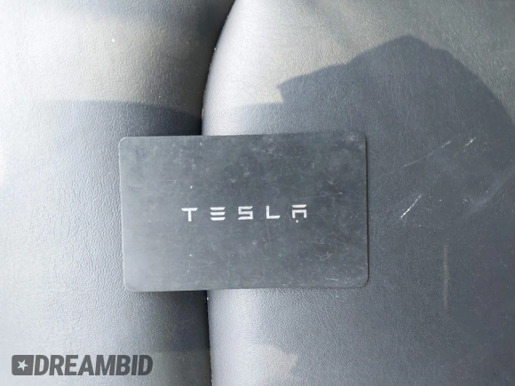 2023 Tesla Model 3 with VIN 5YJ3E1EA7PF409243, listed as a IAAI auction lot 42305360 with Not provided miles and . Bid and sale history available at DreamBid. Image 11.