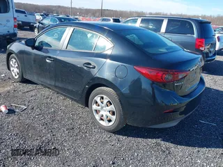 2015 Mazda 3 i Sport with VIN 3MZBM1U72FM210435, listed as a IAAI auction lot 41744470 with 148,624 mi miles. Bid and sale history available at carsss.com. Image 3.