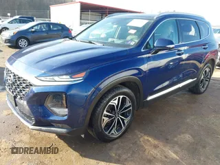 2019 Hyundai Santa Fe Ultimate with VIN 5NMS5CAA6KH117104, listed as a IAAI auction lot 41639157 with 75,507 mi miles and . Bid and sale history available at DreamBid. Image 21.