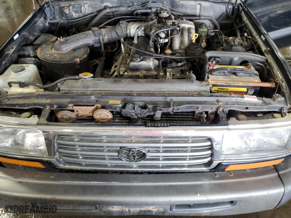 1997 Toyota Land Cruiser with VIN JT3HJ85J0V0184304, listed as a Copart auction lot 72438414 with 310,213 mi miles and Clean Title. Bid and sale history available at carsss.com. Image 12.