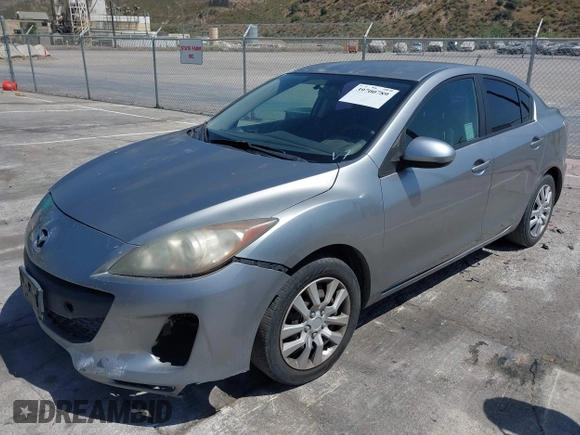 2012 Mazda 3 i Sport with VIN JM1BL1UF4C1595650, listed as a IAAI auction lot 40127921 with 190,421 mi miles and . Bid and sale history available at DreamBid. Image 2.