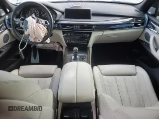 2017 BMW X5 xDrive50i with VIN 5UXKR6C54H0J84099, listed as a Copart auction lot 76269094 with 68,026 mi miles and Salvage title. Bid and sale history available at DreamBid. Image 8.