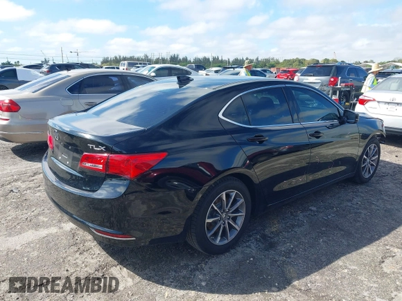 2020 Acura TLX w/Technology Pkg with VIN 19UUB1F57LA016345, listed as a IAAI auction lot 41661004 with 66,501 mi miles. Bid and sale history available at carsss.com. Image 4.