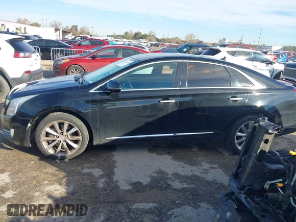 2013 Cadillac XTS Luxury with VIN 2G61P5S34D9237884, listed as a IAAI auction lot 41336761 with 156,830 mi miles and . Bid and sale history available at DreamBid. Image 14.