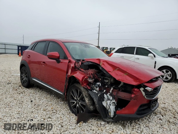 2017 Mazda CX-3 Grand Touring z VIN JM1DKFD79H0162503, wystawiony jako Copart lot #44717205 z przebiegiem 102 013 mil mil oraz Szkoda całkowita • Salvage title. Historia ofert i sprzedaży dostępna na DreamBid. Obrazek 4.