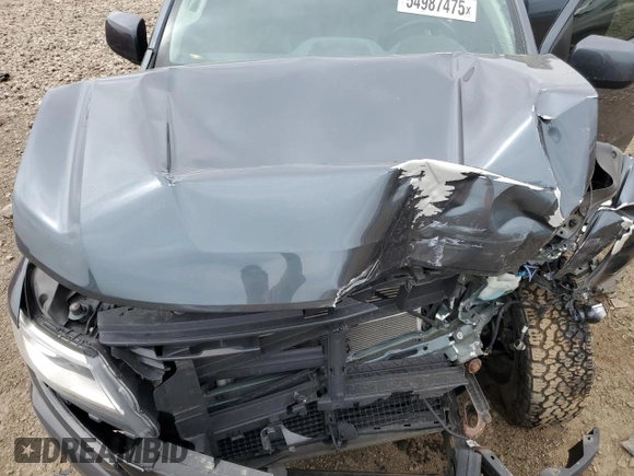 2015 Chevrolet Colorado 4WD Z71 z VIN 1GCGTCE37F1236156, wystawiony jako Copart lot #54987475 z przebiegiem 198 656 mil mil oraz Szkoda całkowita • Salvage title. Historia ofert i sprzedaży dostępna na DreamBid. Obrazek 11.