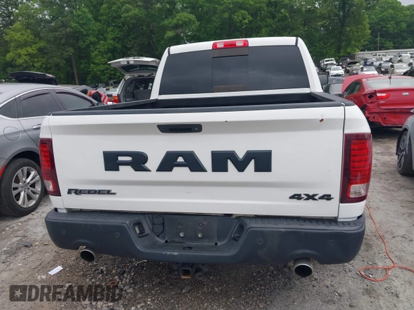 2017 Ram 1500 Rebel with VIN 1C6RR7YT7HS575529, listed as a IAAI auction lot 42125529 with 110,722 mi miles and . Bid and sale history available at DreamBid. Image 16.