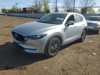 2017 Mazda CX-5 Touring z VIN JM3KFBCL5H0222898, wystawiony jako Copart lot #55179285 z przebiegiem 91 728 mil mil oraz Szkody całkowita. Historia ofert i sprzedaży dostępna na DreamBid. Obrazek 1.
