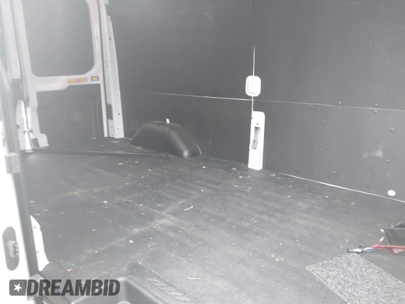 2023 Ford Transit Cargo с VIN 1FTBR2C81PKB94435, выставлен на аукционе IAAI как лот 41374220 с пробегом 18 232 миль миль и . История ставок и продаж доступна на DreamBid. Изображение 8.