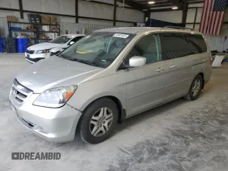 2007 Honda Odyssey EX with VIN 5FNRL38477B429624, listed as a Copart auction lot 53961825 with 144,957 mi miles and Salvage Title. Bid and sale history available at DreamBid. Image 1.