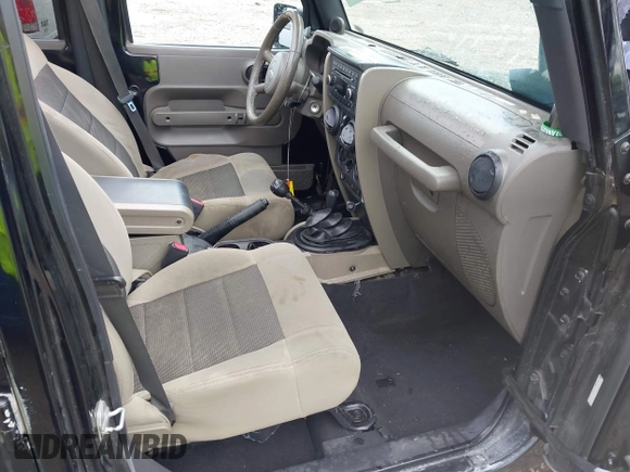 2008 Jeep Wrangler Unlimited X with VIN 1J4GA39108L501130, listed as a IAAI auction lot 42182601 with 177,507 mi miles and . Bid and sale history available at DreamBid. Image 5.
