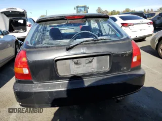 1997 Honda Civic DX with VIN 2HGEJ6344VH119405, listed as a Copart auction lot 71070544 with 26,621 mi miles and Salvage Title. Bid and sale history available at carsss.com. Image 6.