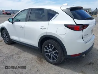 2018 Mazda CX-5 Touring with VIN JM3KFACM3J0381122, listed as a IAAI auction lot 42023838 with 76,121 mi miles. Bid and sale history available at carsss.com. Image 3.
