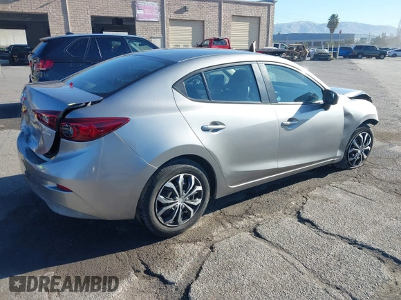 2015 Mazda 3 i SV with VIN JM1BM1T75F1258853, listed as a IAAI auction lot 41279651 with 36,437 mi miles. Bid and sale history available at carsss.com. Image 4.