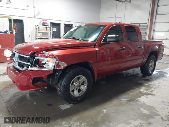2008 Dodge Dakota SLT z VIN 1D7HW48N38S542692, wystawiony jako IAAI lot #41554521 z przebiegiem 166 482 mil mil oraz . Historia ofert i sprzedaży dostępna na DreamBid. Obrazek 20.