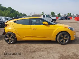 2013 Hyundai Veloster w/Black Int with VIN KMHTC6AD7DU161769, listed as a IAAI auction lot 42448221 with 139,936 mi miles and . Bid and sale history available at DreamBid. Image 13.