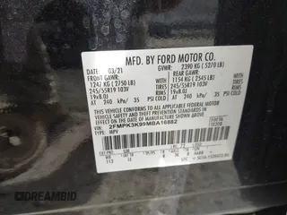 2021 Ford Edge Titanium z VIN 2FMPK3K99MBA16882, wystawiony jako IAAI lot #42214606 z przebiegiem 140 031 mil mil oraz . Historia ofert i sprzedaży dostępna na DreamBid. Obrazek 9.